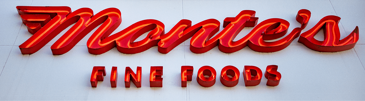 montes fine foods open face lit logo signage
