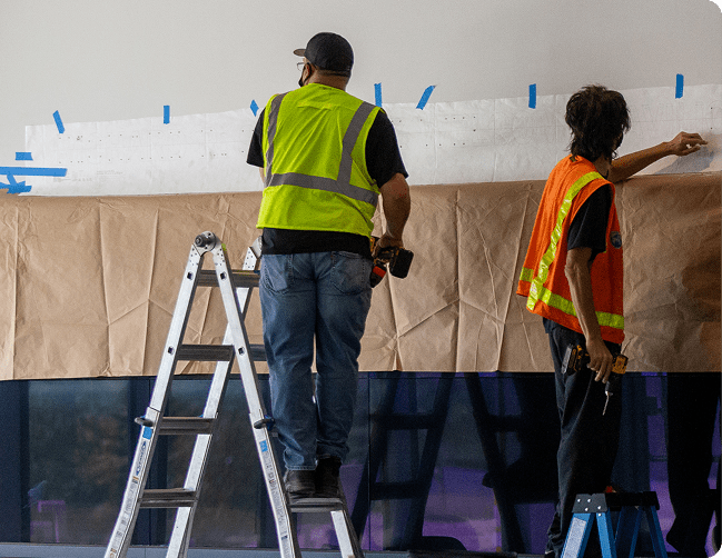 specialized installation team preparing sign install