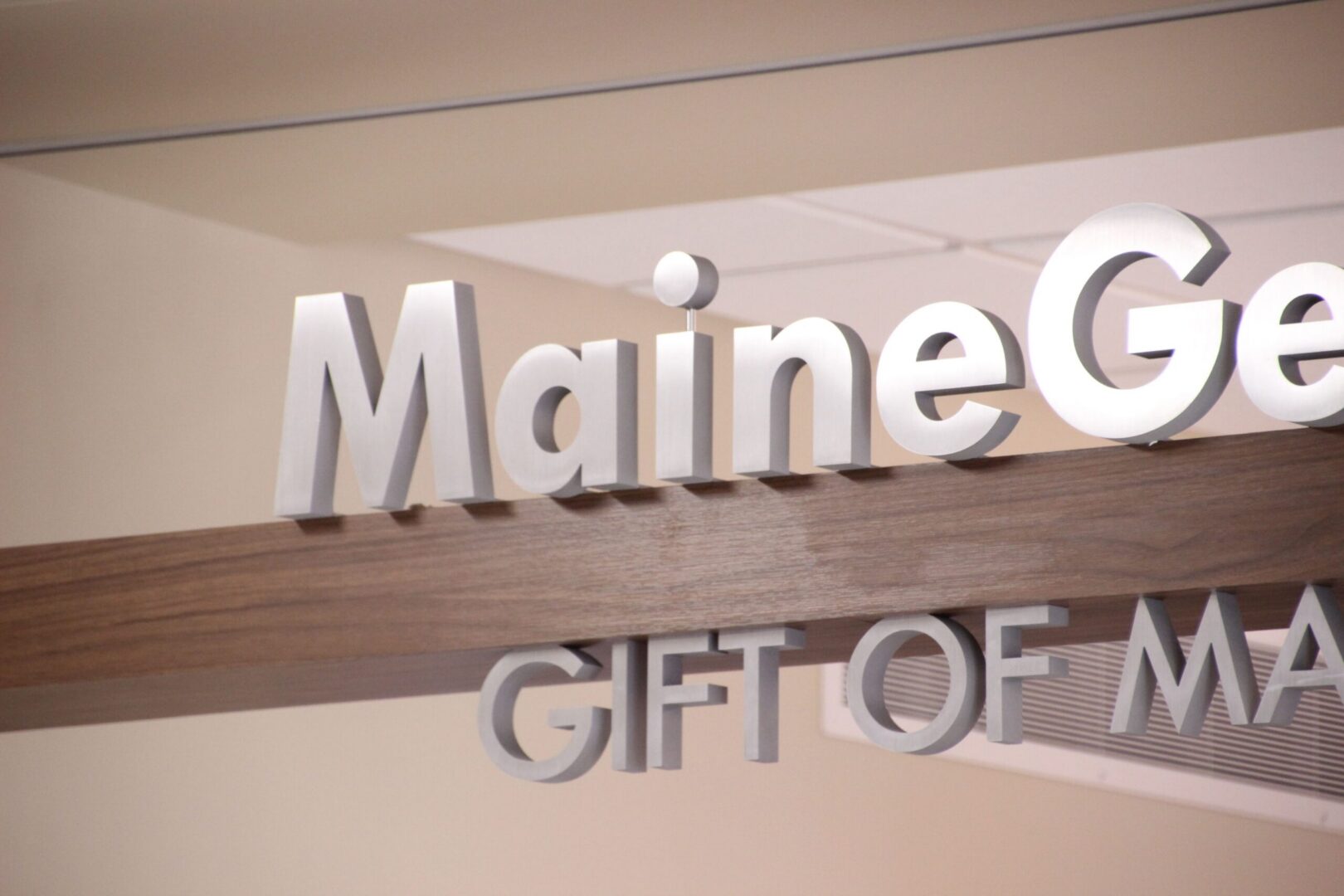 maine general health dimensional letter logo