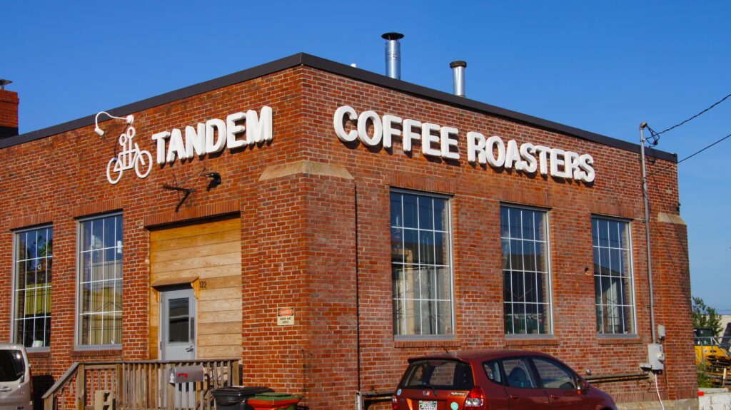 Tandem Coffee Roasters combination lit exterior lettering on storefront